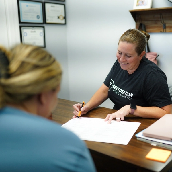 Coach reviewing InBody results with a member